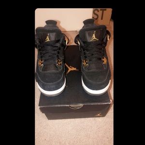 Jordan Black and Gold Royalty 4’s